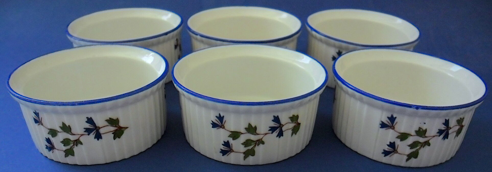 Suite of six porcelain ramekins decorated with barbels