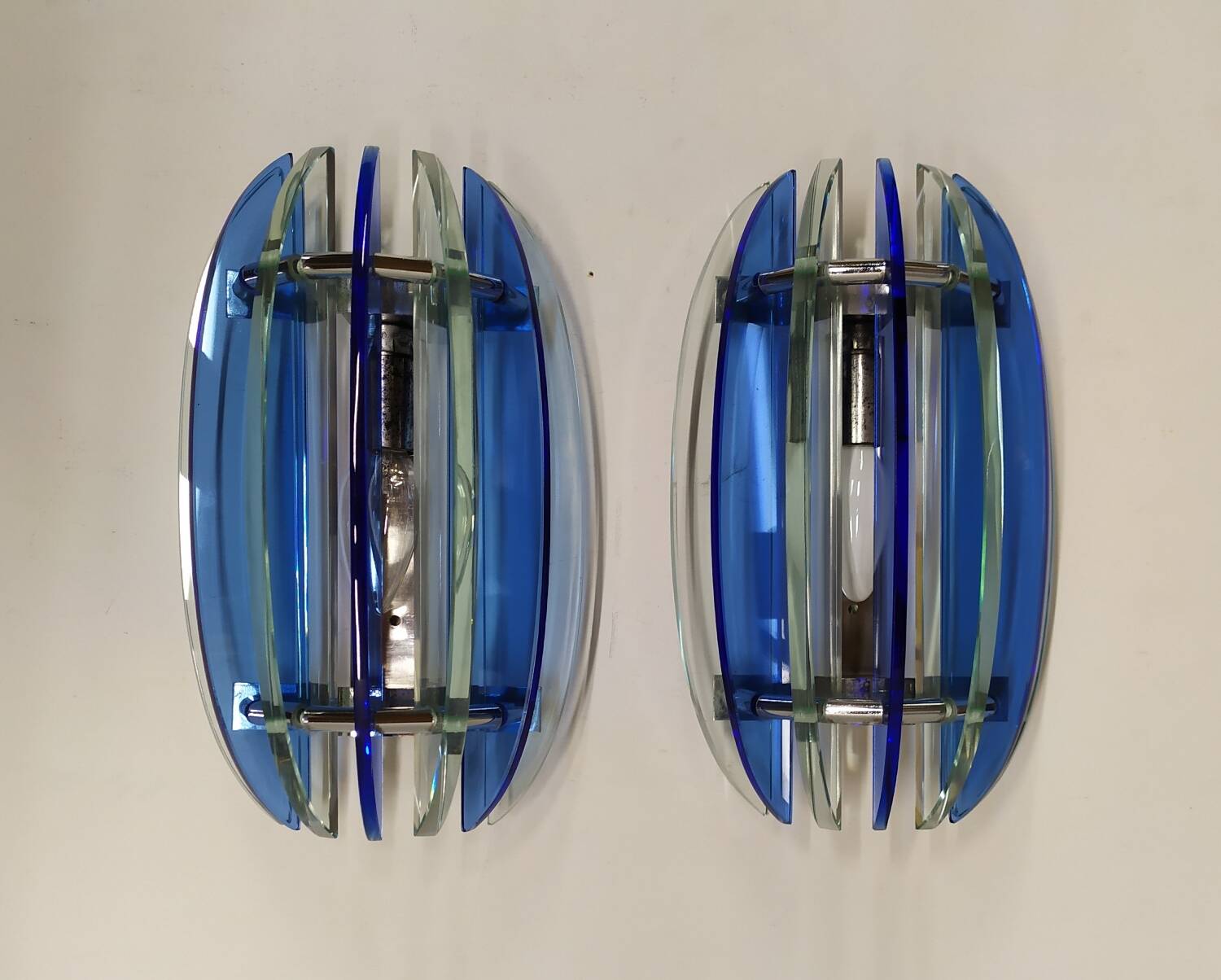 Two Veca wall lights, Italy, 1970s.