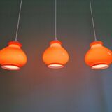 Trio of vintage orange opaline pendant lights, 1960-70