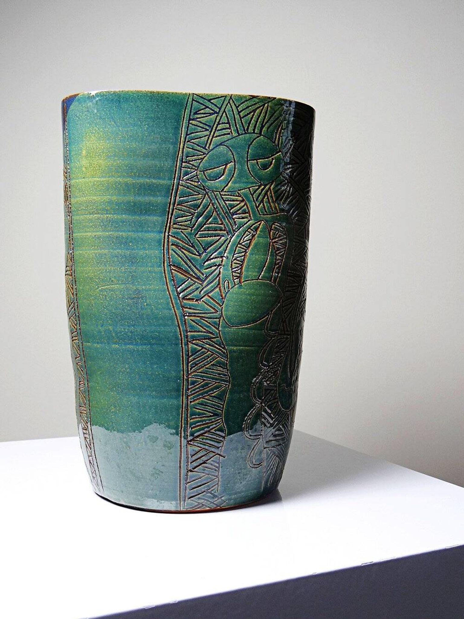 Vintage blue-green handcrafted pottery vase with incised tribal design by Eseka Pottery