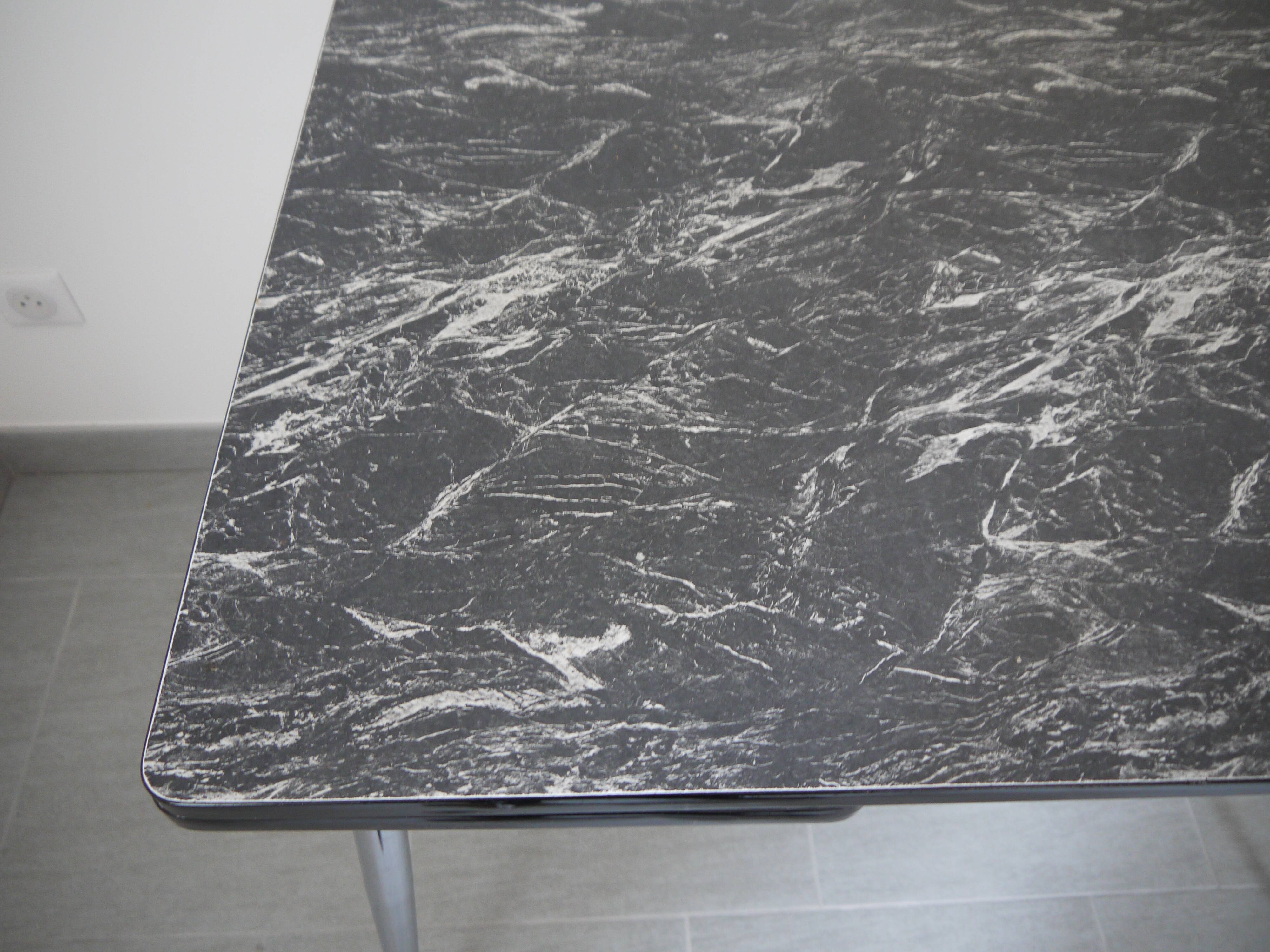 Black and white marbled formica table