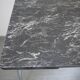 Table en formica marbré noir et blanc