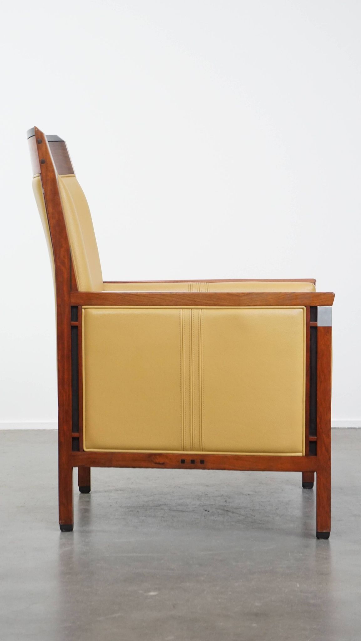 Art Deco armchair in yellow leather with high back