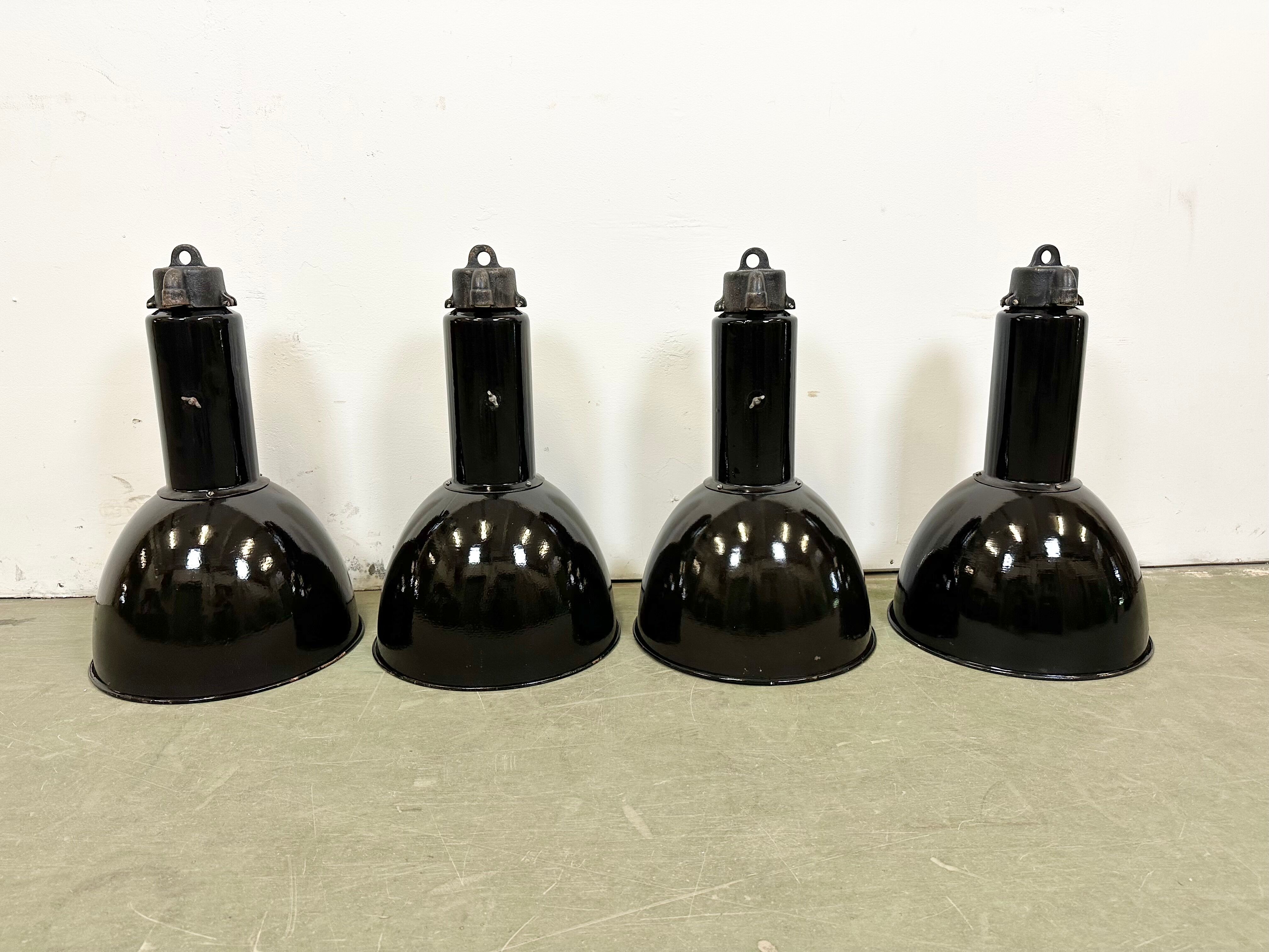 Set of 4 industrial bauhaus black enamel pendant lamps, 1960s