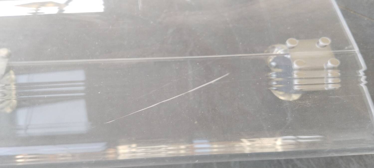 Plexiglas coffee table on wheels