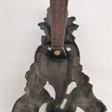 Pair of bronze andirons with black patina, 19th century, female caryatids