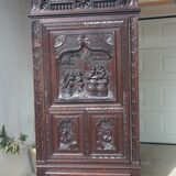 Carved oak bonnet maker, late 19th century