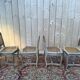 Suite de 4 chaises cannées de style Louis XV rechampi