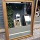 17th century Italian style gilded mirror in carved wood.