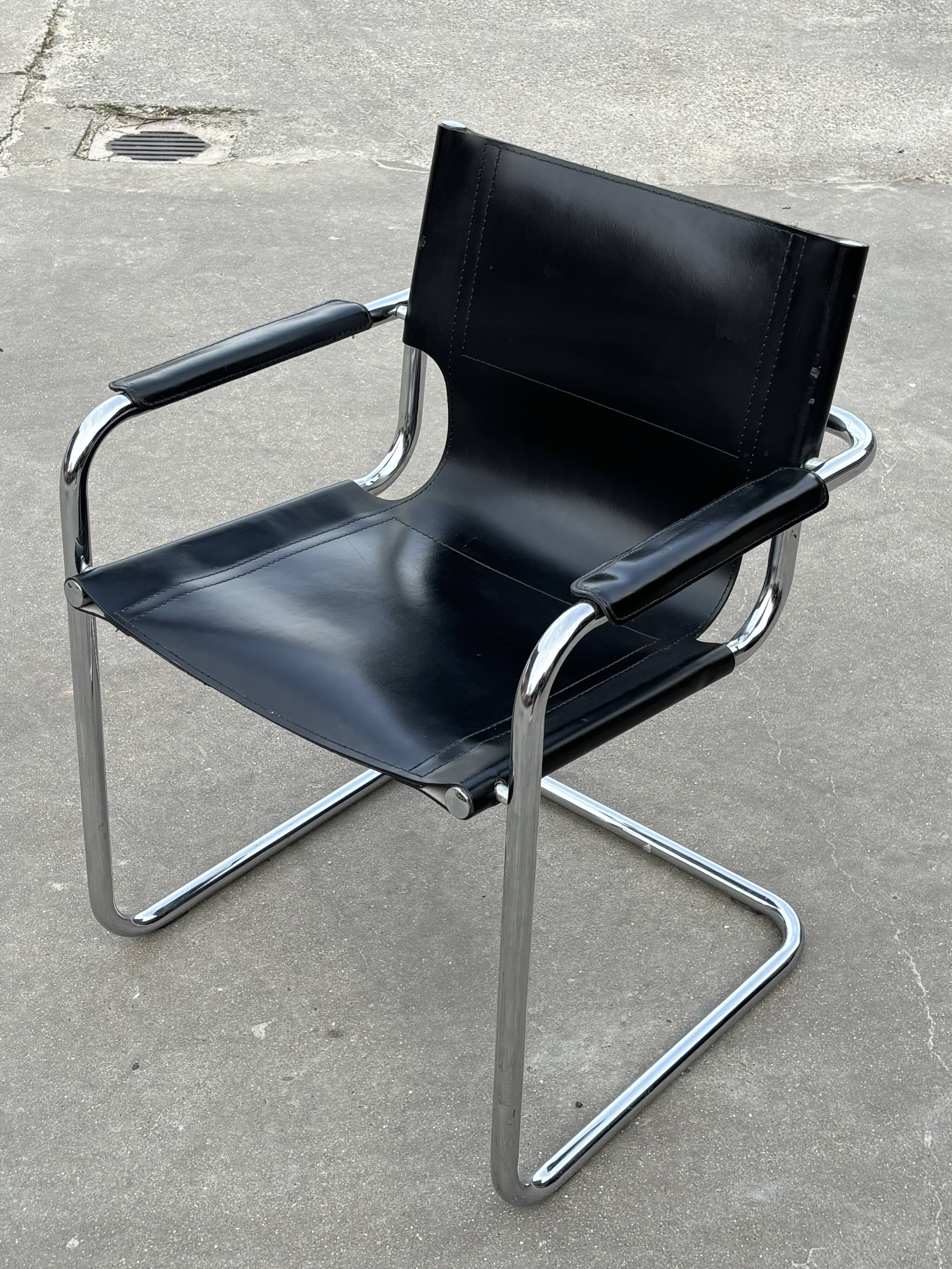 Set of 4 design cantilever chairs black and chrome design made in Italy