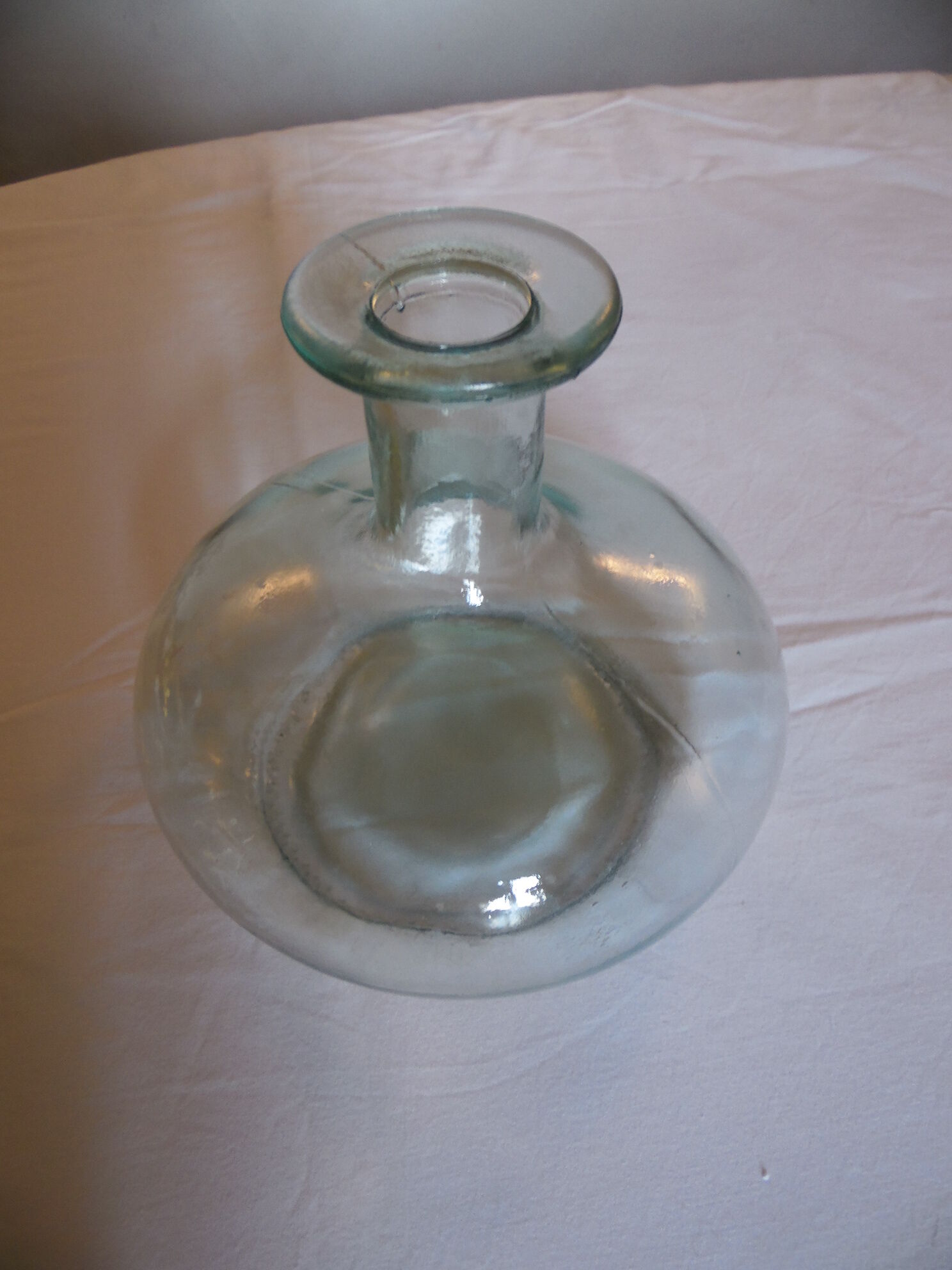 Pale green transparent glass flattened sphere shape vase