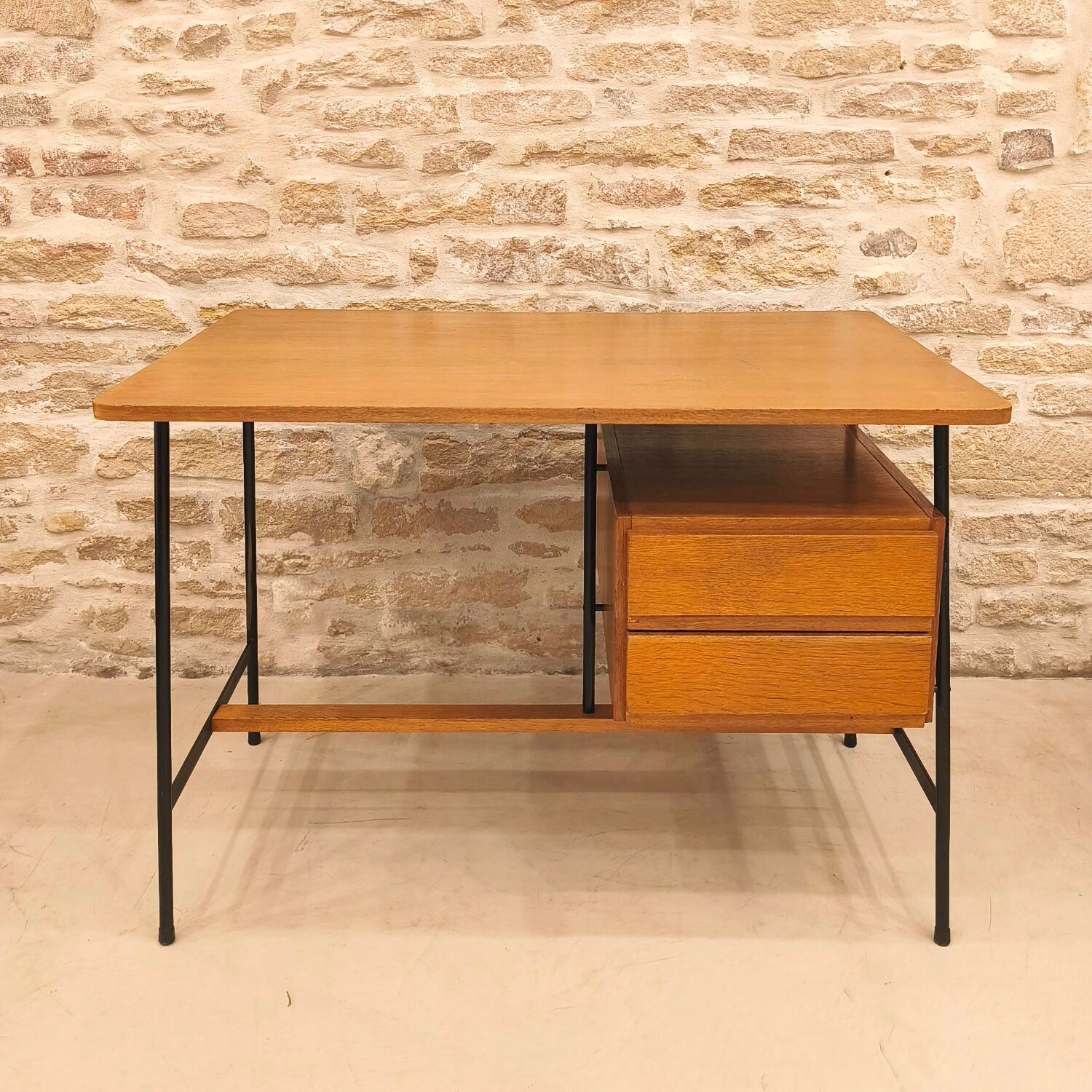 Modernist desk with suspended drawer unit, French work from the 1950s.