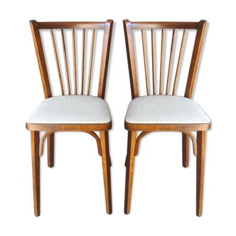 Paire de chaises vintage Baumann en skaï beige 1960
