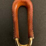 Carl Auböck pipe rack in leather and bronze, 1963