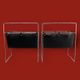 Pair of magazine racks in chromed metal and black leatherette, 1970s