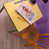 Old school desk in yellow formica