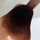 Old italian amphora vase in hammered copper