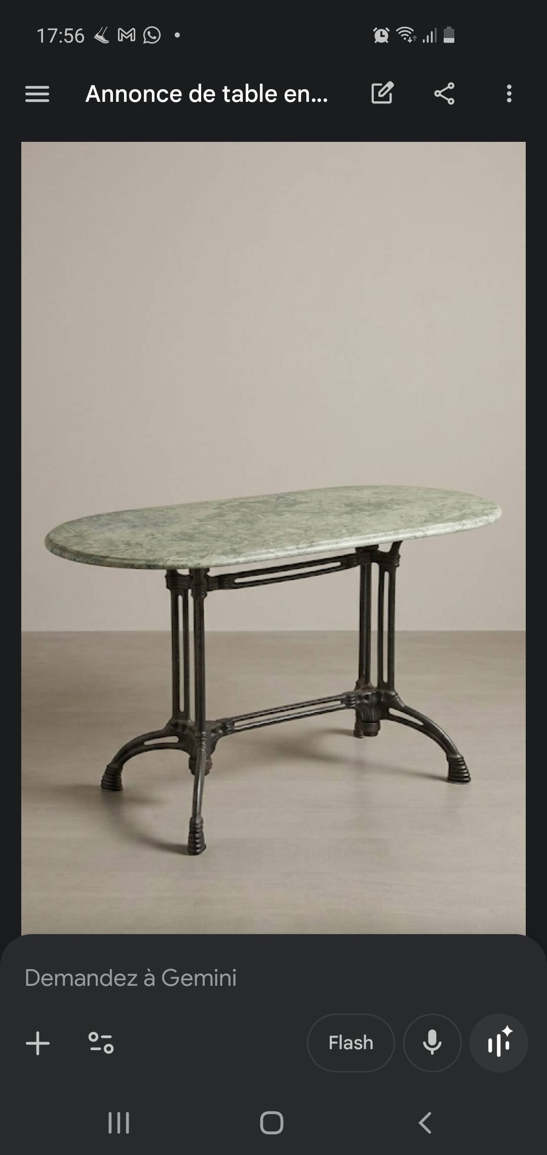 Table ovale en marbre vert à orthocères & pied en fonte / fer forgé