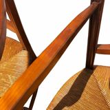 Pair of straw and cherry armchairs