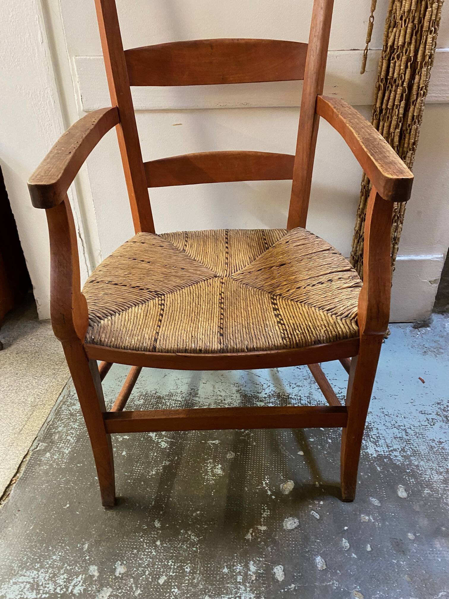 provençal armchair with dark beech armrests two-tone straw seat