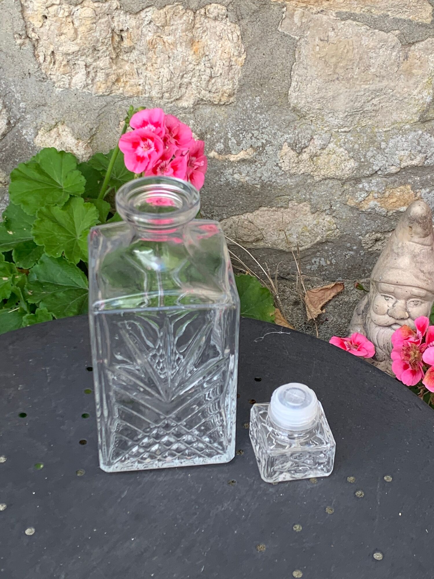 Ice bucket and whiskey decanter made of vintage chiseled transparent glass