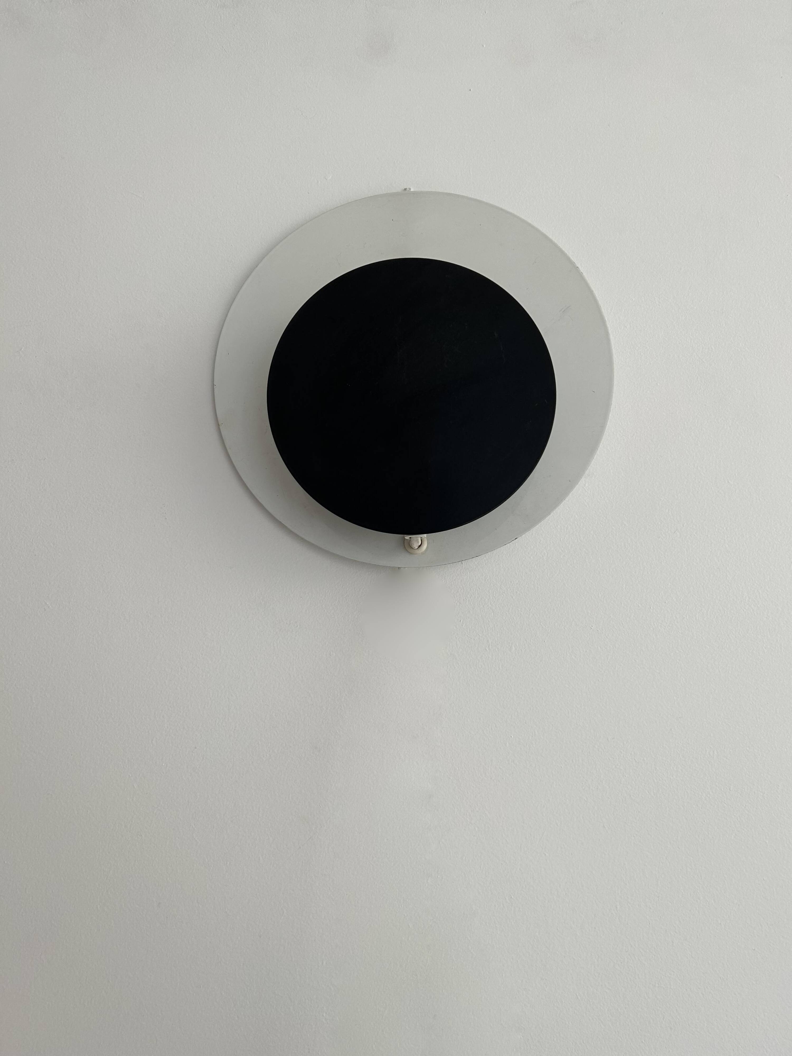 Vintage "Cirkle" wall lamp in black and white lacquered metal, Denmark 1970s