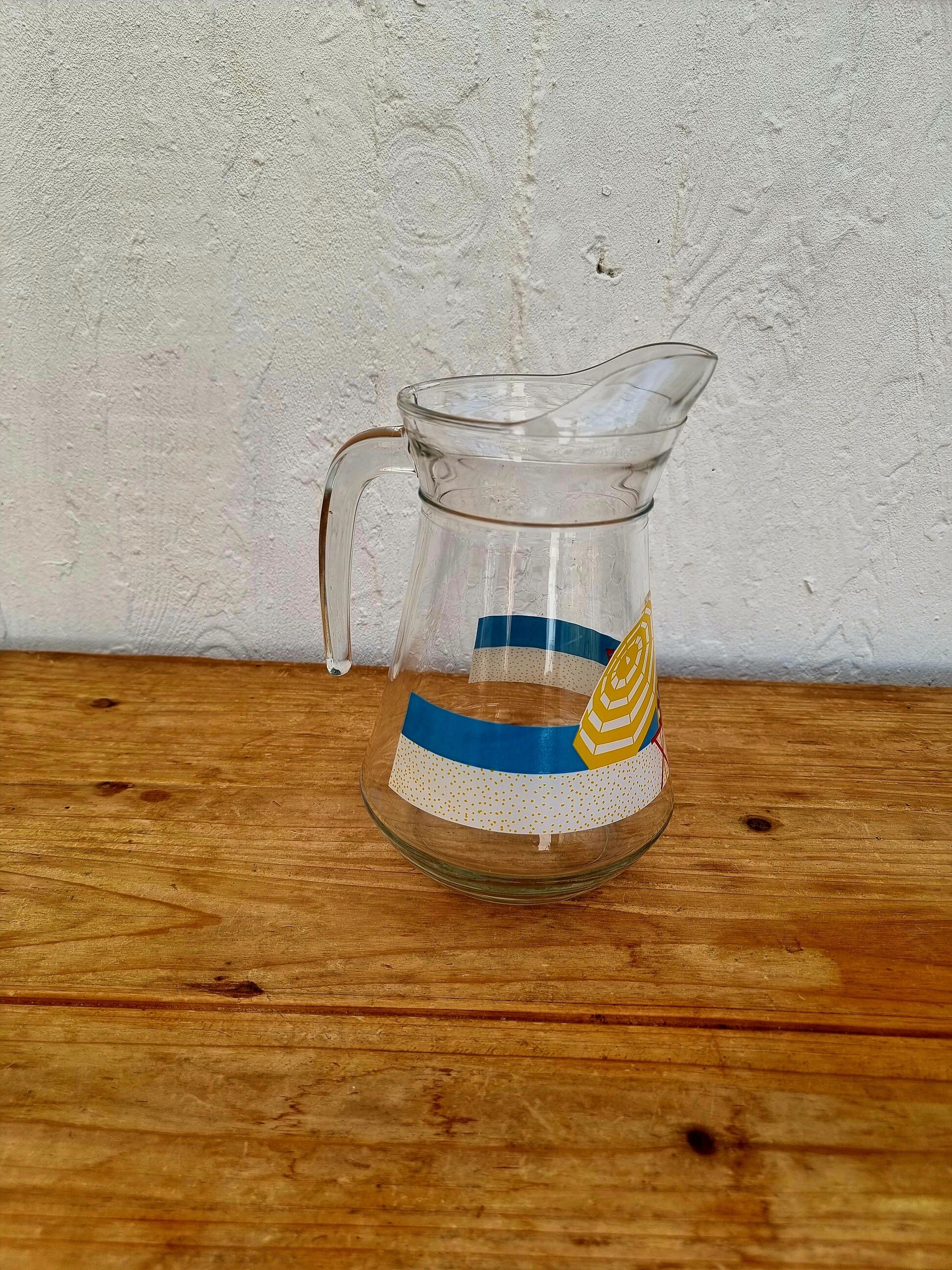 Jug with a summer design in vintage glass