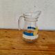 Jug with a summer design in vintage glass