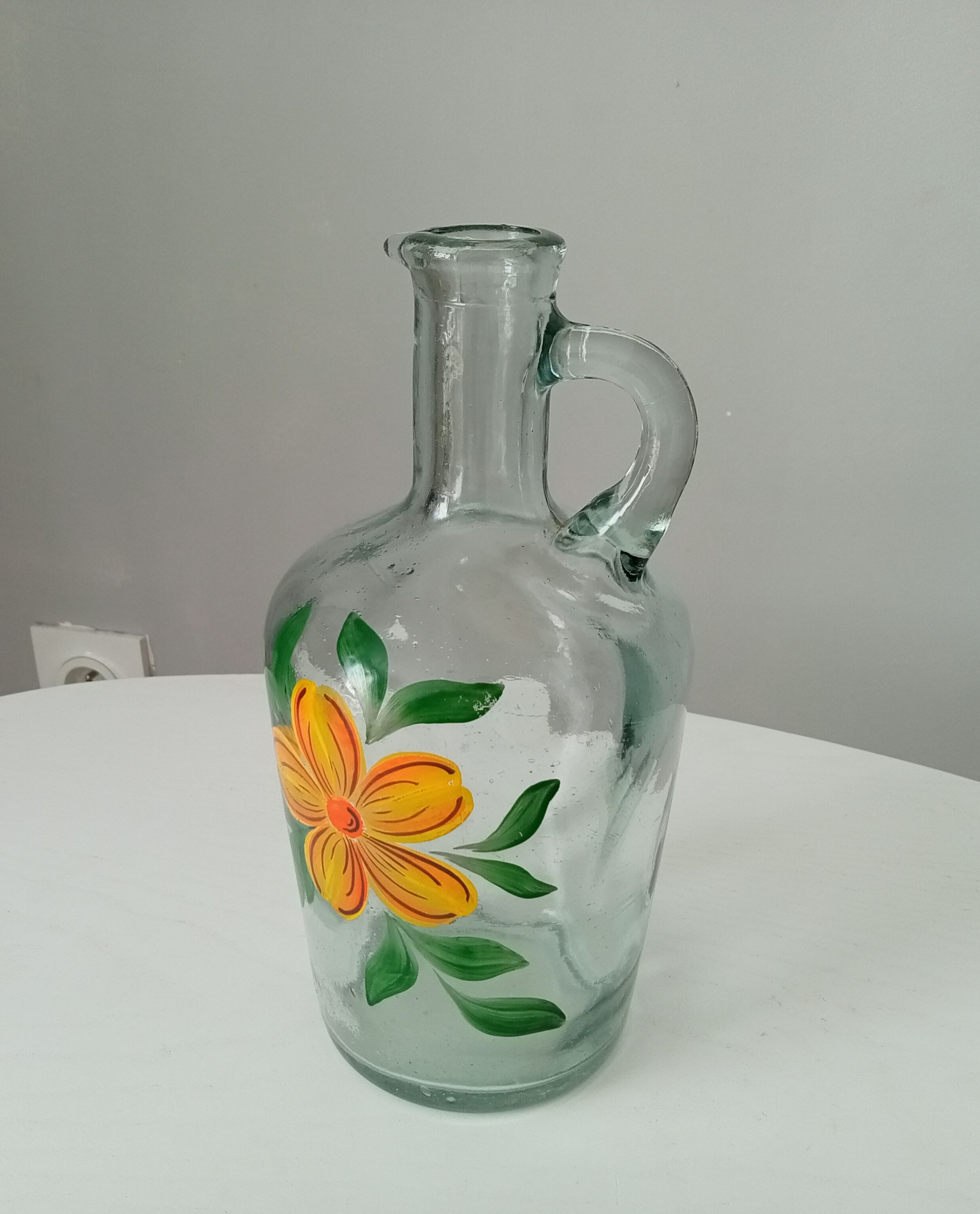 Vintage pitcher made of blown glass