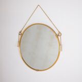 Hanging mirror in gilded brass