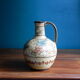 Hand-painted terracotta jug