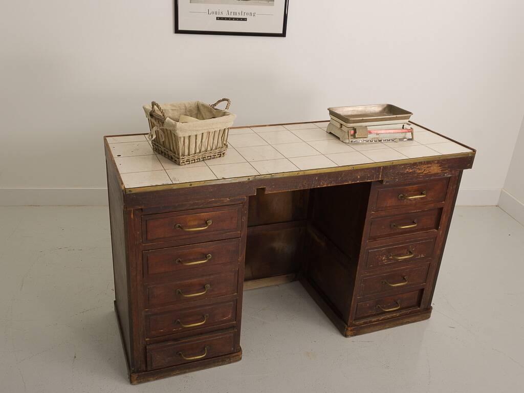 Small vintage stained wooden countertop with 2 shelves and 10 drawers