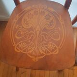 4 bistro chairs in curved wood and art nouveau patterns