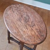 Candle holder side table with spool legs