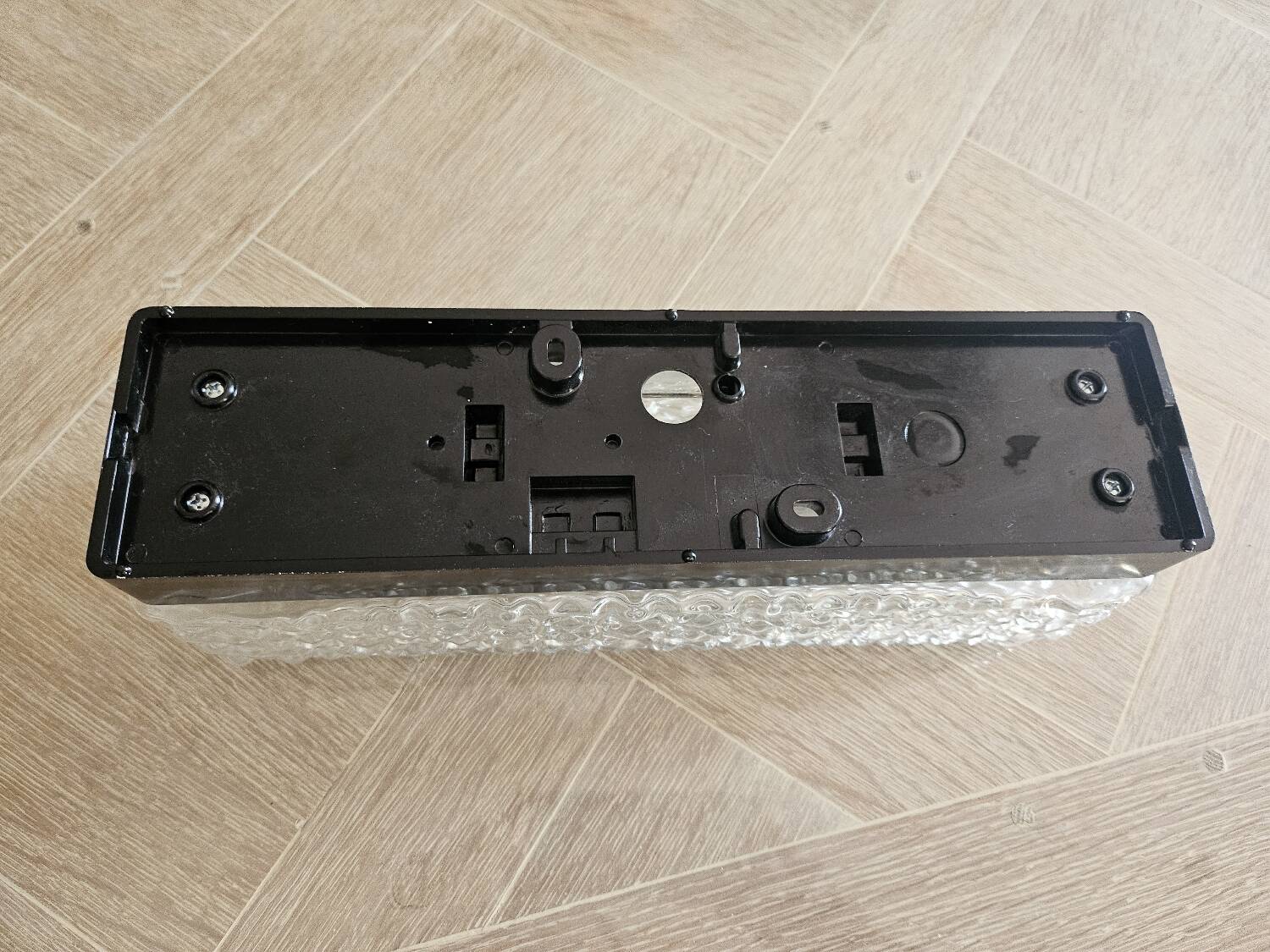 Hammered glass wall light