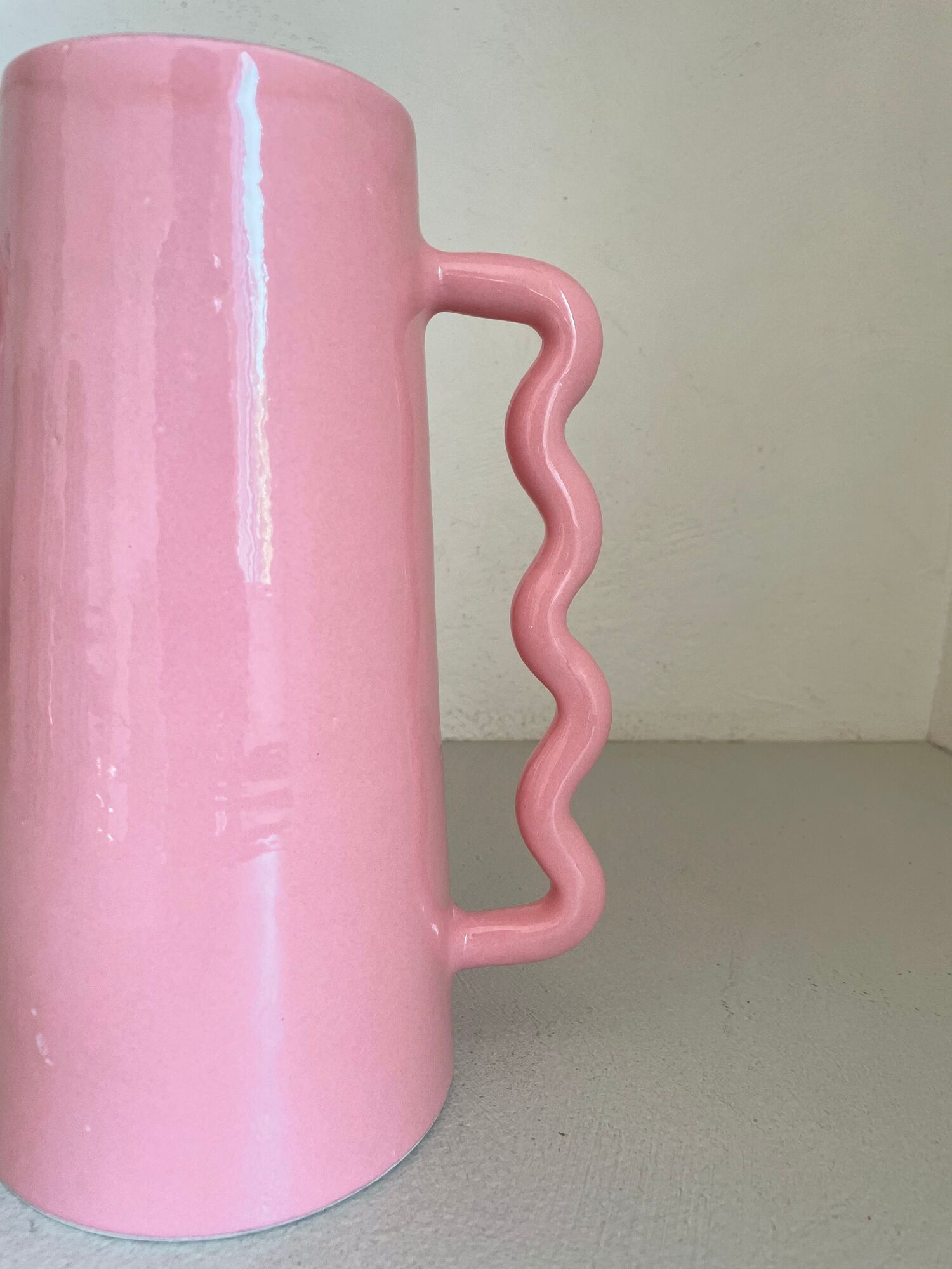 Handmade abstract corrugated handle pink ceramic vase