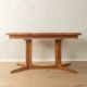 Glostrup dining table, 1980s, solid teak, by Johs. Kristoffersen & Søn, with two extension leaves