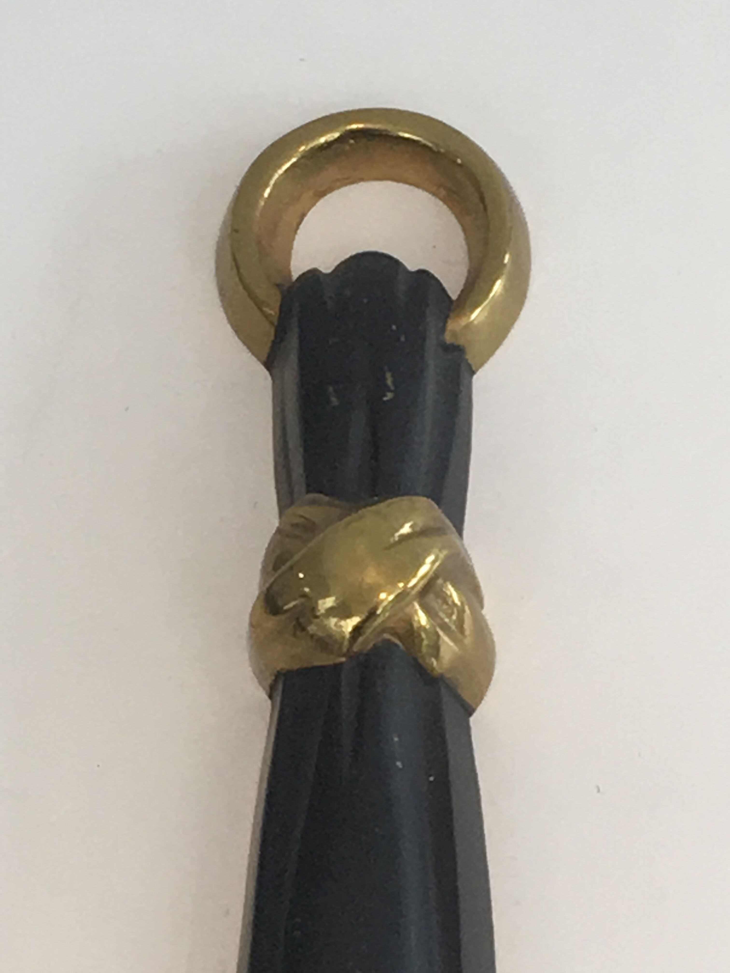 Pair of Black Lacquered Bronze Wall Lamps with Lions' Head Decorations. Around 1970