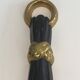 Pair of Black Lacquered Bronze Wall Lamps with Lions' Head Decorations. Around 1970