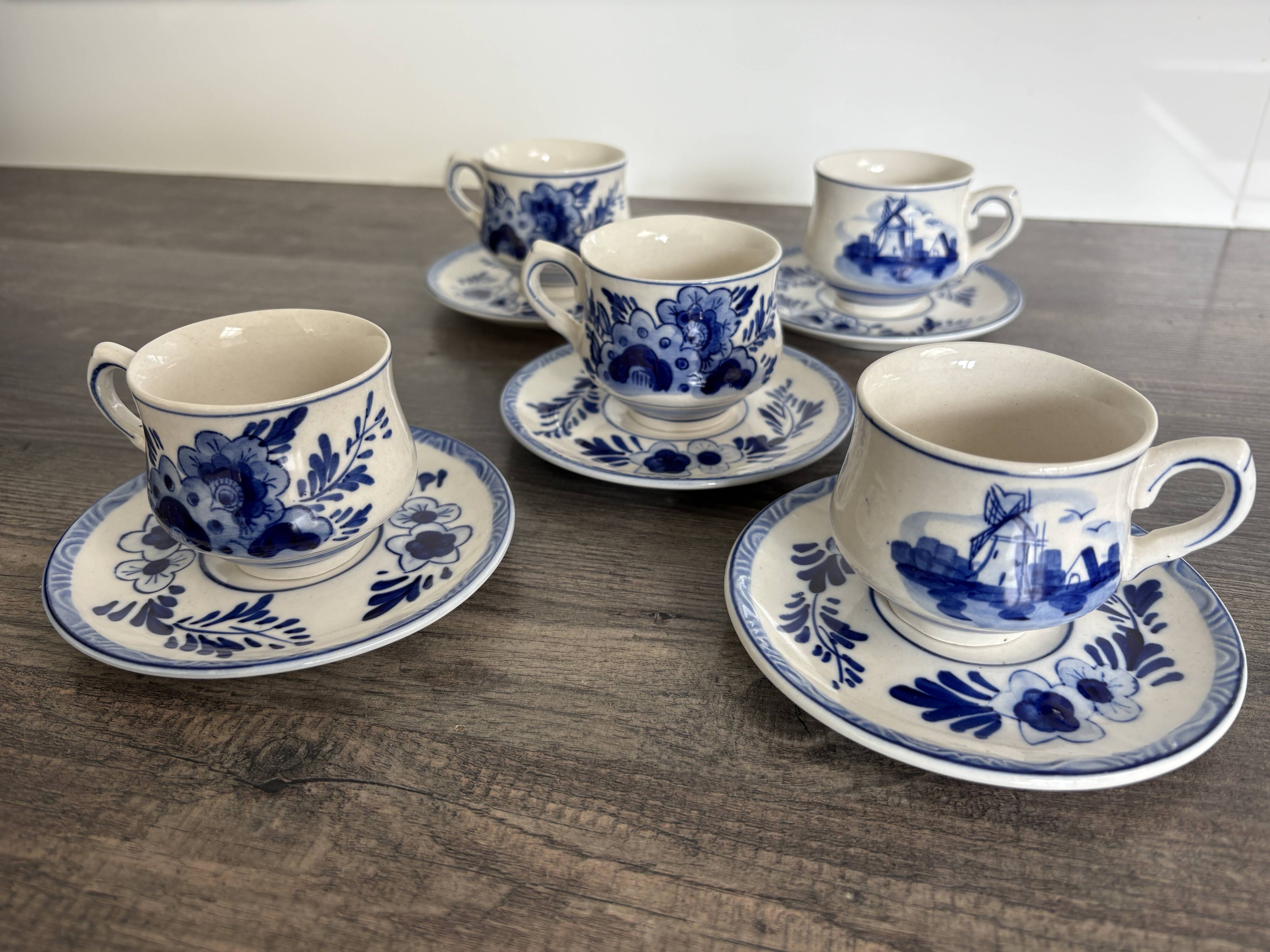 Vintage Dutch Delft Blue earthenware service for 5 cups and saucers.