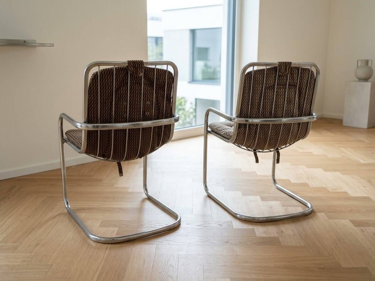 2 vintage designer chairs from the 70s in the style of Willy Rizzo, space age.