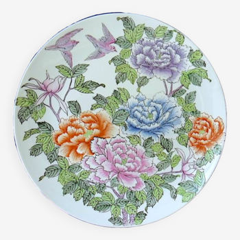 Assiette en porcelaine de la Chine à décor floral et ornithologique