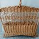 Old woven rattan magazine rack from the 1950s-60s
