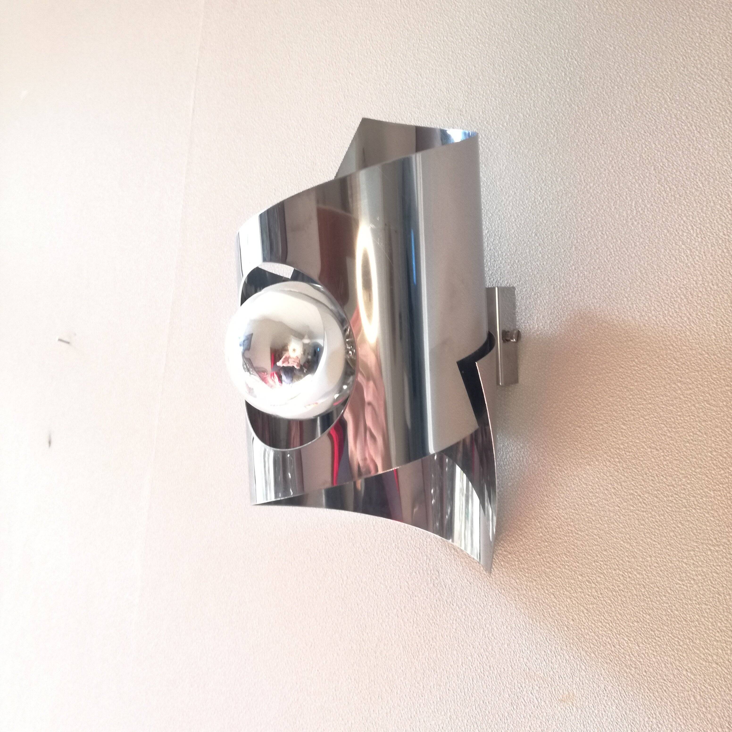 Space Age polished stainless steel wall light from the 1970s