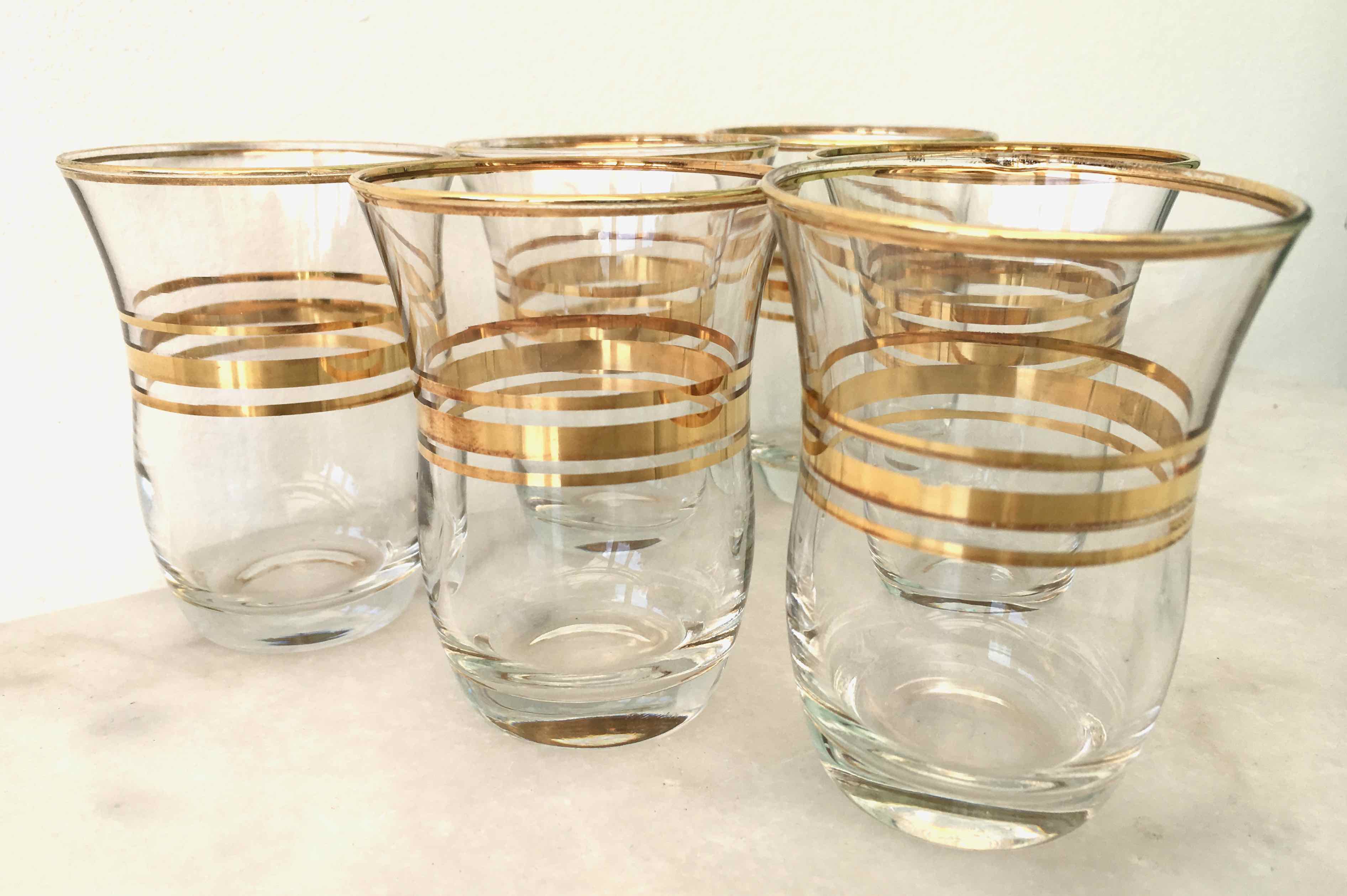 Six glasses of vintage alcohol cups