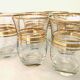Six glasses of vintage alcohol cups