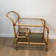 Rattan rolling table and leather ties