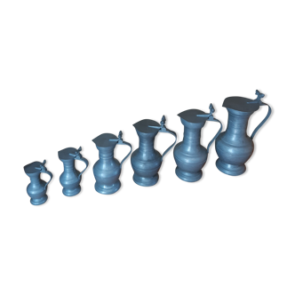 Series of tin pitchers