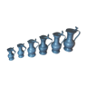 Series of tin pitchers