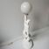 Lampe femme céramique et globe opaline année 80